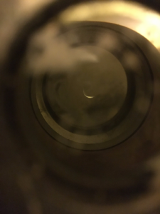 Photo Adam took through his peep hole one night. Tweeted with “But as I analyzed it, and started noticing things. Part of a face. An ear, and an eye staring right back at me.”