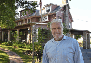 Bob Cranmer standing in front of the Brownsville Road House
