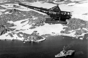 A Navy helicopter surveys Antarctica’s terrain during Operation Highjump