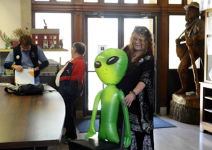 Audrey setting up at a UFO conference in Leominster Town Hall in 2015.