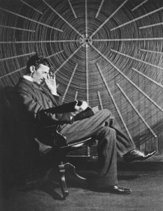 Tesla in front of his famed coils he used in his experiments. Courtesy of Wikipedia.org via https://en.wikipedia.org/wiki/Nikola_Tesla