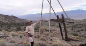 Kenny visiting an abandoned mine shaft during his hike. Courtesy of AllThatsInteresting.com, and Youtube/snakebitmcgee*