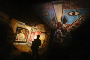 Some of the art decorating the catacombs in 2004. Courtesy of Jean-Francois DEROUBAIX/Gamma-Rapho/Getty Images and AllThatsInteresting.com